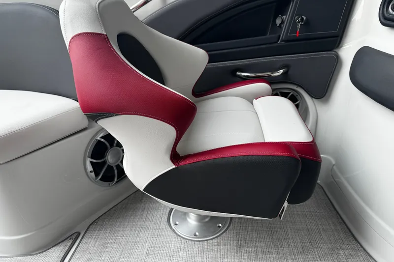 Slide: The Image of Luxury seating in 2026 Crownline 298 SS boat, featuring red and white upholstery. - 4