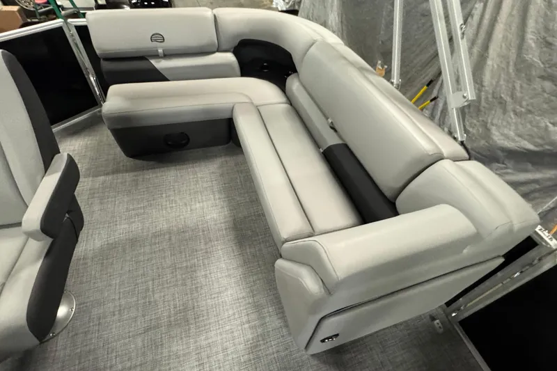 Slide: The Image of 2026 Sun Tracker Party Barge 20 DLX interior with gray seating and modern design. - 10