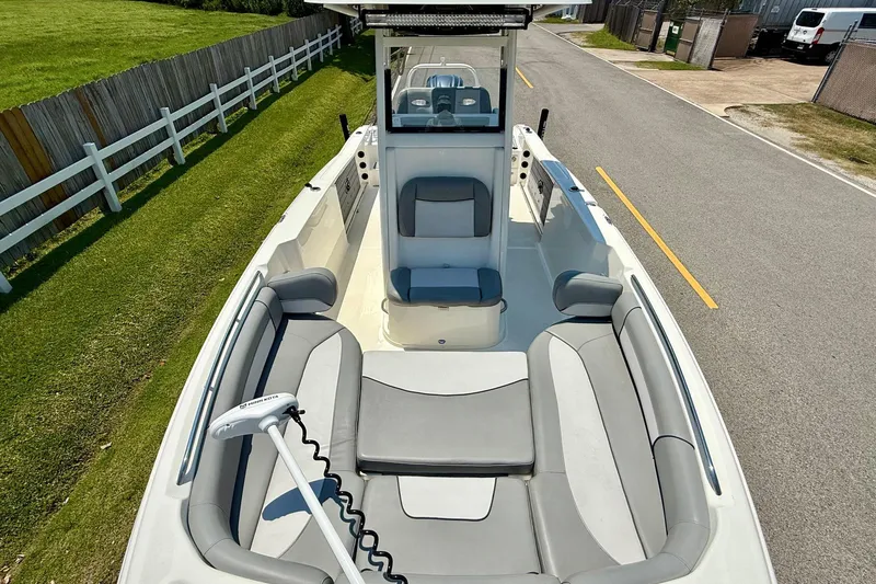 Slide: The Image of 2022 NauticStar 251 Hybrid boat with spacious seating and modern design. - 17