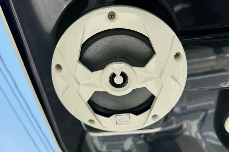 Slide: The Image of JBL speaker on 2022 NauticStar 251 Hybrid boat, close-up view. - 21