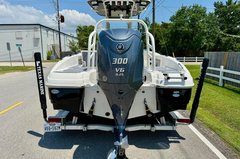 Slide: The Image of 2022 NauticStar 251 Hybrid boat with Yamaha 300 V6 engine on trailer. - 3