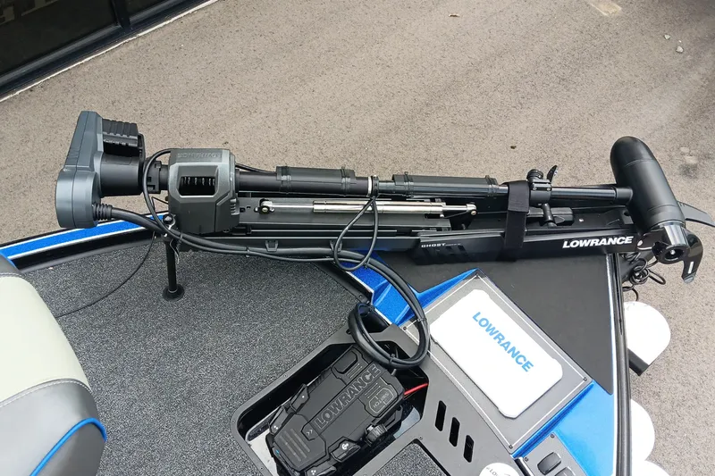 Slide: The Image of Triton 20XP 2025 boat with Lowrance trolling motor and equipment on deck. - 9