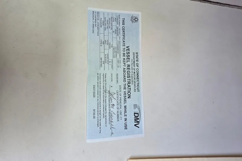 Slide: The Image of Connecticut vessel registration certificate for 1987 Catalina 30 MkII sailboat. - 17