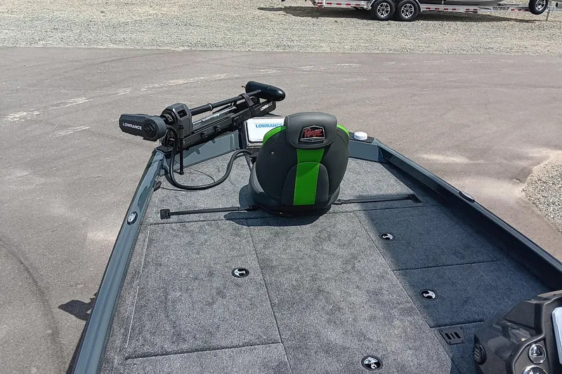 Slide: The Image of 2025 Ranger RT188P boat deck with Lowrance equipment and green-accented seat. - 9