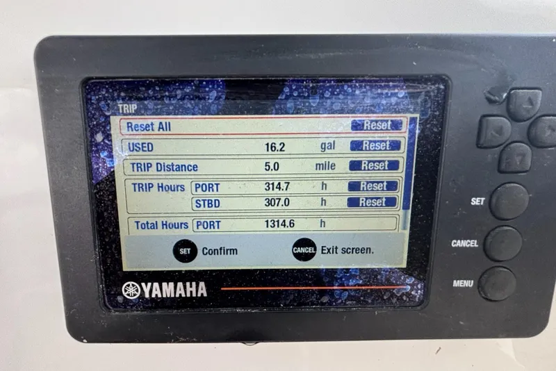 Slide: The Image of Yamaha trip monitor displaying fuel usage and trip details on a 2016 Sea Fox 286 boat. - 19