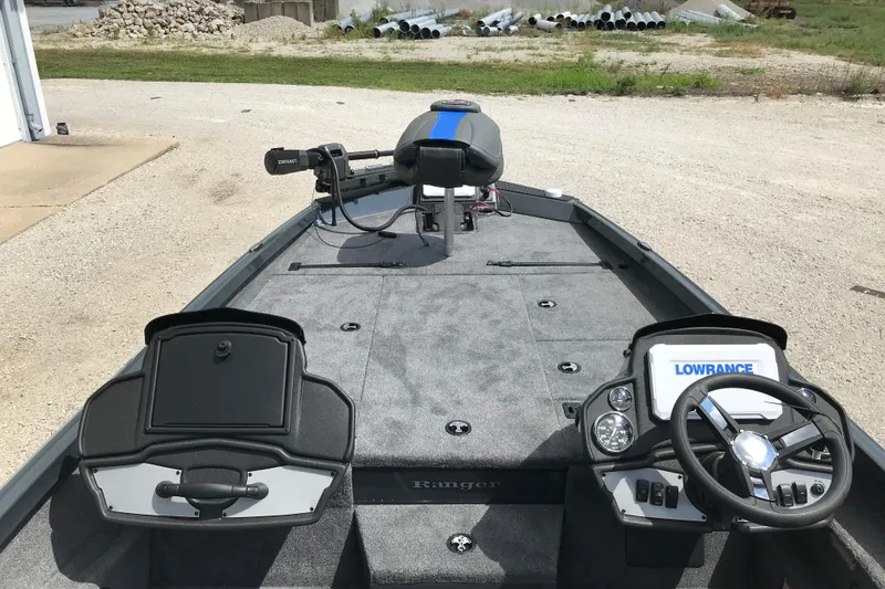 Slide: The Image of Lowrance device installed in 2026 Ranger RT198P boat, featuring cables and cup holder. - 12