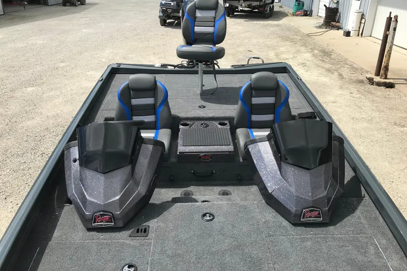 Slide: The Image of 2026 Ranger RT198P boat interior with storage compartment and carpeted flooring. - 15