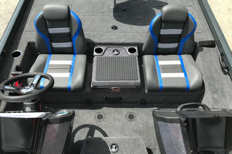 Slide: The Image of 2026 Ranger RT198P boat interior with dual seats, steering wheel, and console. - 18