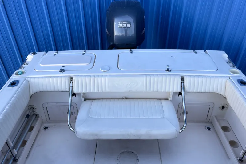 Slide: The Image of 2006 Grady-White Tournament 225 boat interior with Yamaha 225 engine. - 23