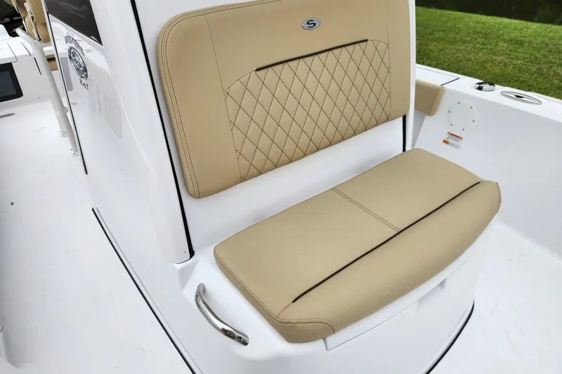 Slide: The Image of Luxurious seating on 2026 Sportsman Masters 247 Bay Boat with tan upholstery. - 16