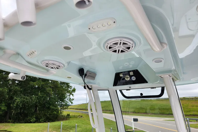 Slide: The Image of 2026 Sportsman Masters 247 Bay Boat interior with speakers and control panel. - 20