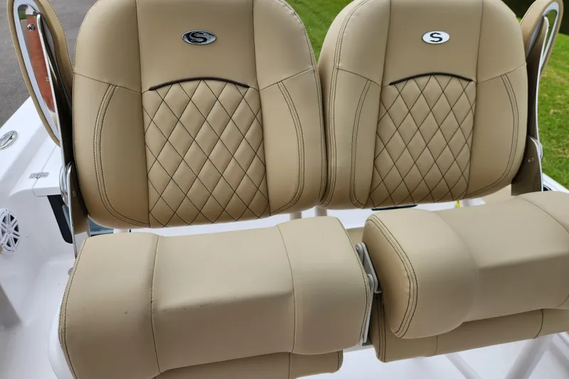 Slide: The Image of 2026 Sportsman Masters 247 Bay Boat tan leather seats with diamond stitching. - 23