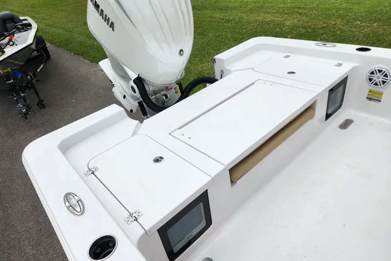 Slide: The Image of 2026 Sportsman Masters 247 Bay Boat with Yamaha engine, featuring spacious deck and storage compartments. - 27