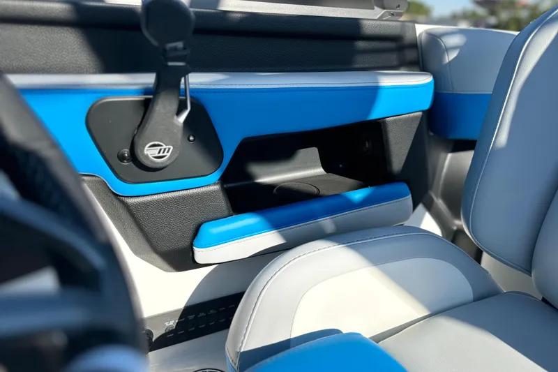 Slide: The Image of Interior of 2025 Malibu Wakesetter 23 LSV, featuring blue and gray seating. - 15