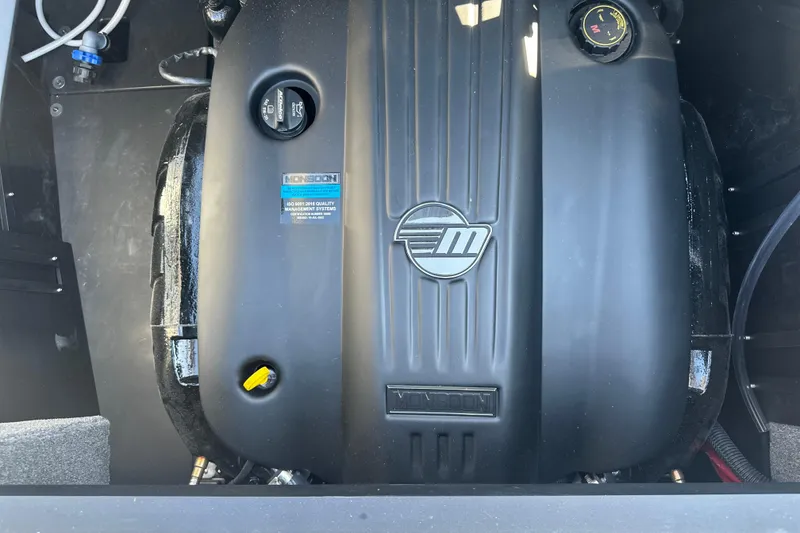 Slide: The Image of 2025 Malibu Wakesetter 23 LSV engine compartment with Monsoon engine branding. - 19