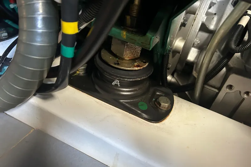 Slide: The Image of Engine compartment of a 2018 Beneteau Swift Trawler 44, showing mechanical components and wiring. - 40