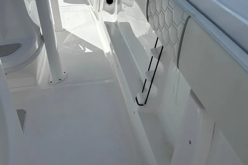 Slide: The Image of Interior view of 2026 Glasstream 280 Pro-XS boat, featuring sleek white design elements. - 16