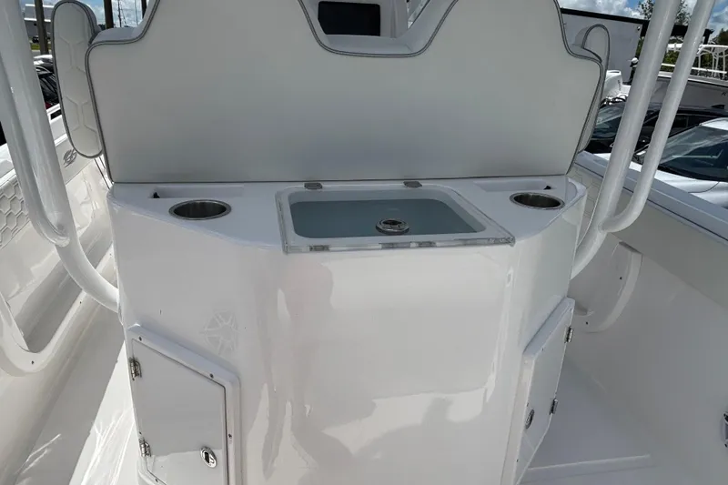 Slide: The Image of 2026 Glasstream 280 Pro-XS boat interior with sink and storage compartments. - 24