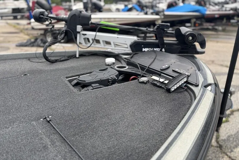 Slide: The Image of 2019 Nitro Z20 boat deck with fishing equipment and trolling motor. - 10