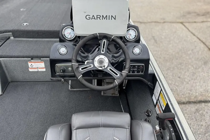 Slide: The Image of 2019 Nitro Z20 boat dashboard with Garmin GPS and steering wheel. - 16