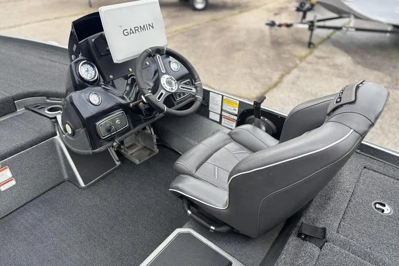Slide: The Image of 2019 Nitro Z20 boat cockpit with Garmin display and comfortable seating. - 17