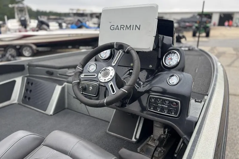 Slide: The Image of 2019 Nitro Z20 boat dashboard with Garmin GPS and steering wheel. - 7
