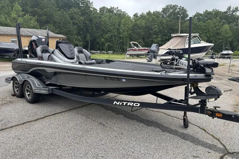 Slide: The Image of 2019 Nitro Z20 boat on trailer in outdoor setting. - 9