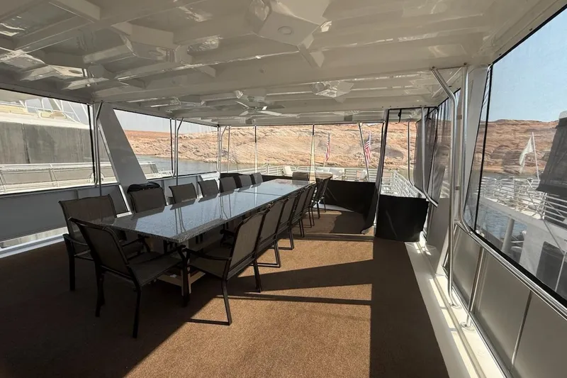 Slide: The Image of Spacious dining area on 2025 Sumerset Relentless Multiple Shares houseboat with panoramic views. - 15