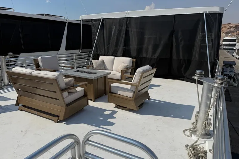 Slide: The Image of Rooftop deck of 2025 Sumerset Relentless Multiple Shares with outdoor seating and table. - 19