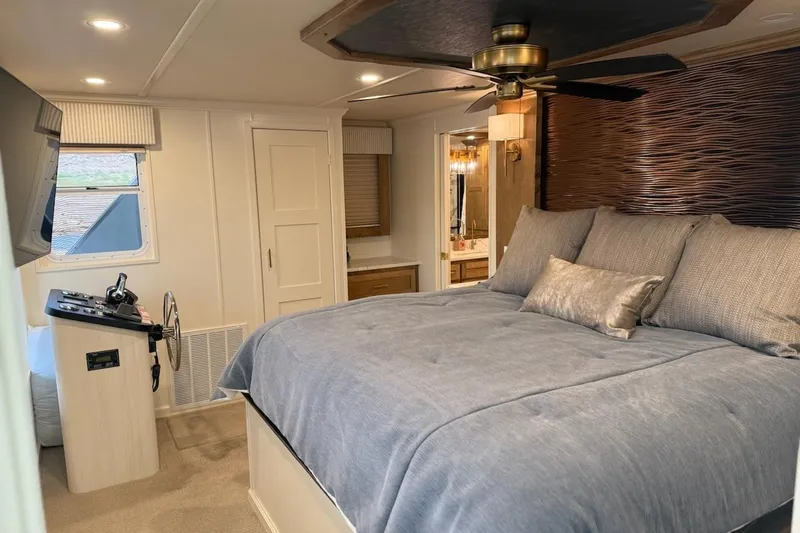 Slide: The Image of Luxurious bedroom in 2025 Sumerset Relentless Multiple Shares houseboat, featuring modern decor and amenities. - 26