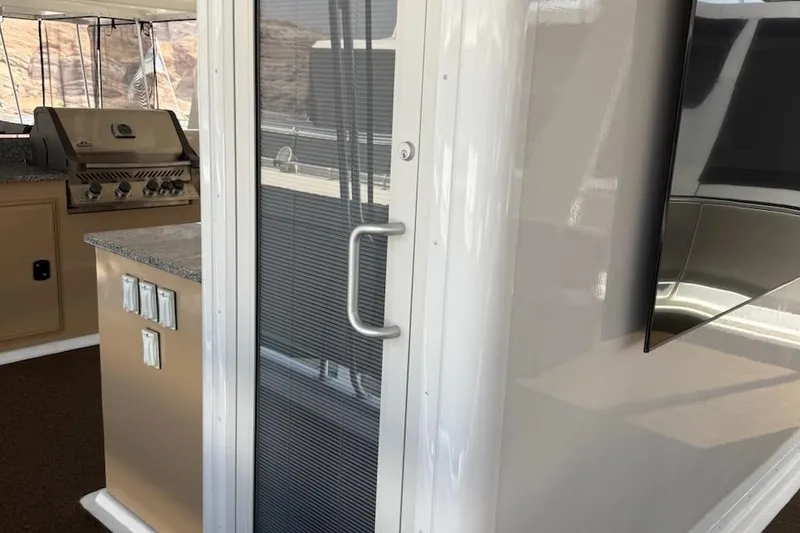 Slide: The Image of Interior view of 2025 Sumerset Relentless Multiple Shares with grill and modern design. - 3