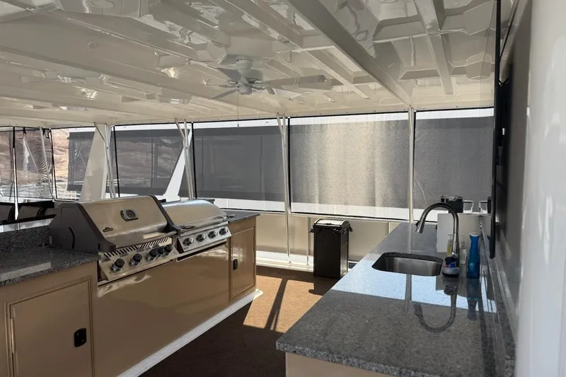 Slide: The Image of Modern outdoor kitchen on 2025 Sumerset Relentless Multiple Shares houseboat. - 9