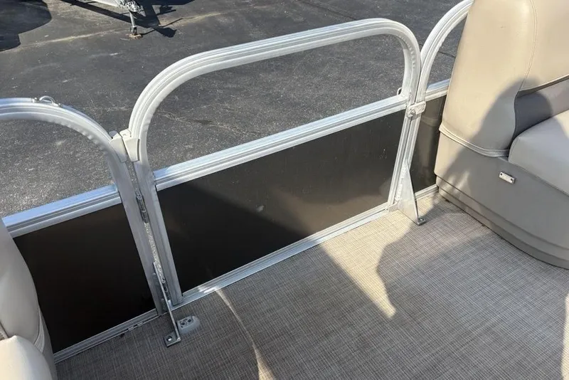 Slide: The Image of Interior view of 2021 Sun Tracker Party Barge® 18 DLX pontoon boat with seating and railing. - 13