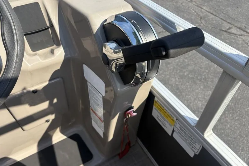 Slide: The Image of Close-up of 2021 Sun Tracker Party Barge® 18 DLX throttle control. - 14