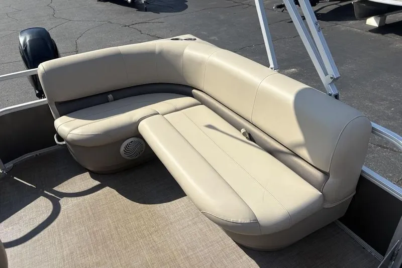 Slide: The Image of 2021 Sun Tracker Party Barge® 18 DLX, beige seating, spacious deck, outdoor leisure. - 19