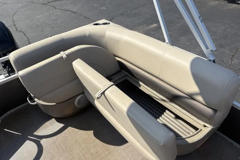 Slide: The Image of 2021 Sun Tracker Party Barge® 18 DLX seating with storage compartment open. - 20
