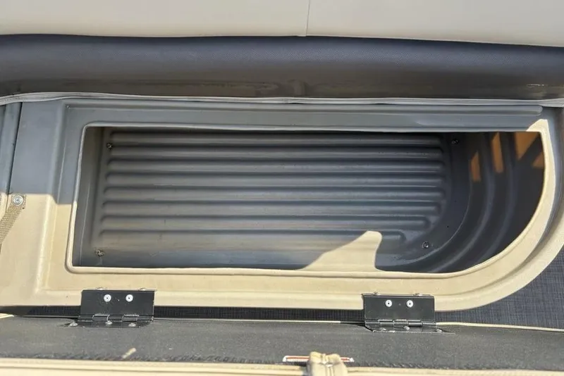 Slide: The Image of Storage compartment of 2021 Sun Tracker Party Barge® 18 DLX pontoon boat. - 3
