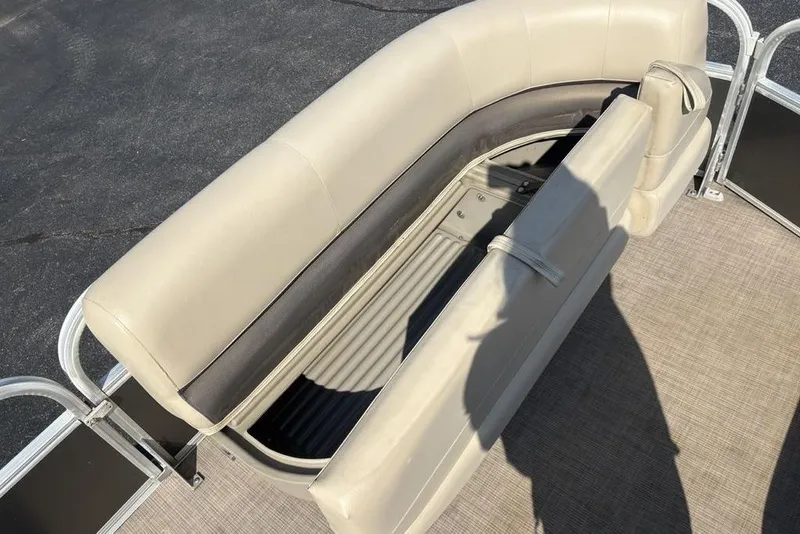 Slide: The Image of 2021 Sun Tracker Party Barge® 18 DLX boat seat with storage compartment open. - 5