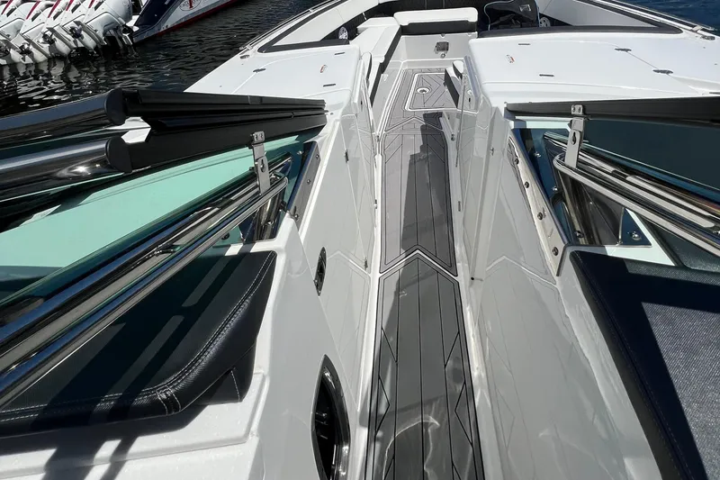 Slide: The Image of 2023 Monterey 385 Super Sport boat deck with sleek design and modern features. - 21