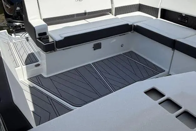 Slide: The Image of 2023 Monterey 385 Super Sport boat interior with sleek seating and modern design. - 35