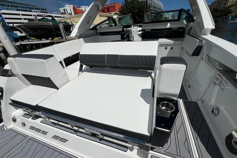 Slide: The Image of 2023 Monterey 385 Super Sport boat interior with luxurious seating and modern design. - 38