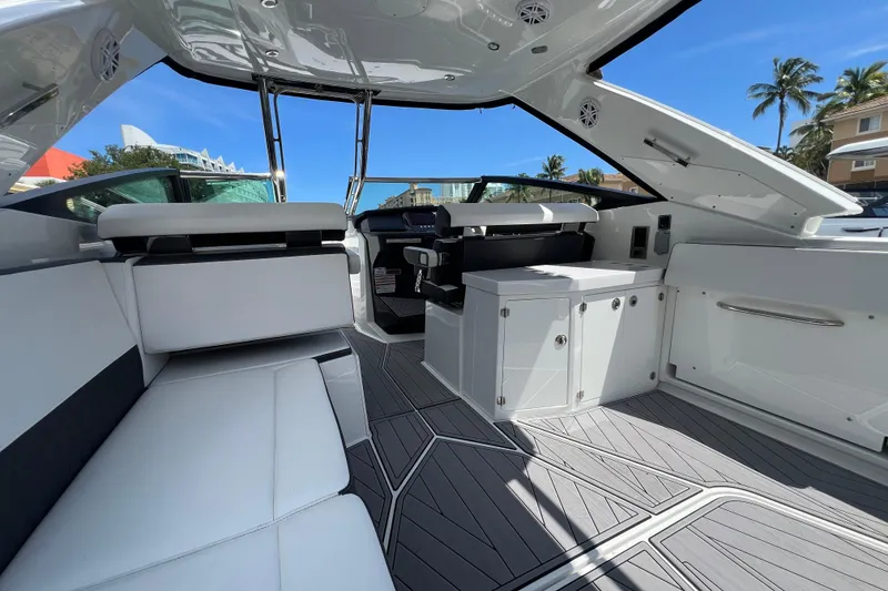 Slide: The Image of 2023 Monterey 385 Super Sport boat interior with sleek seating and modern design. - 40