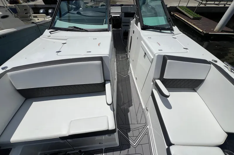 Slide: The Image of 2023 Monterey 385 Super Sport boat interior with sleek seating and modern design. - 41