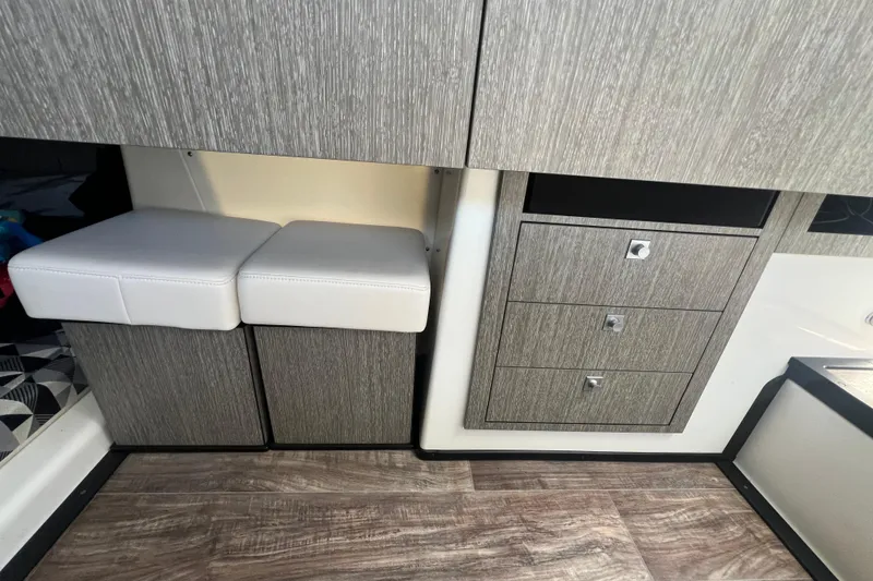 Slide: The Image of Interior of 2023 Monterey 385 Super Sport with modern cabinetry and seating. - 47