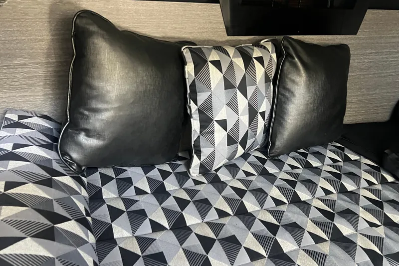 Slide: The Image of Luxurious interior of 2023 Monterey 385 Super Sport with geometric-patterned cushions. - 50