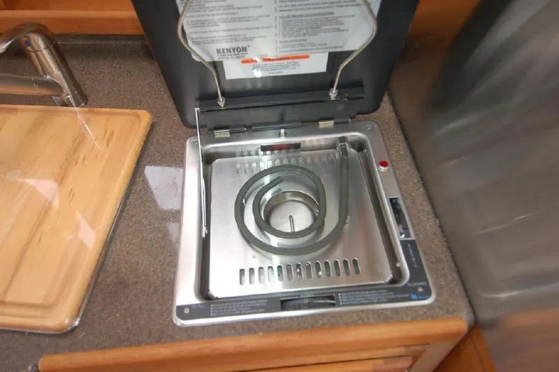 Slide: The Image of Electric stove in 2016 Ranger Tugs R25 SC boat kitchen, featuring a single burner. - 11