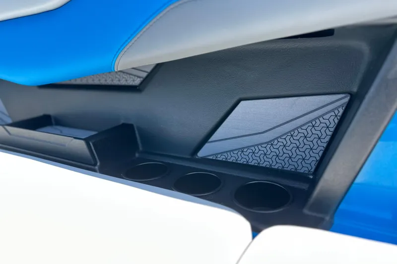 Slide: The Image of Interior detail of 2026 Axis T235 boat with blue and gray seating. - 15