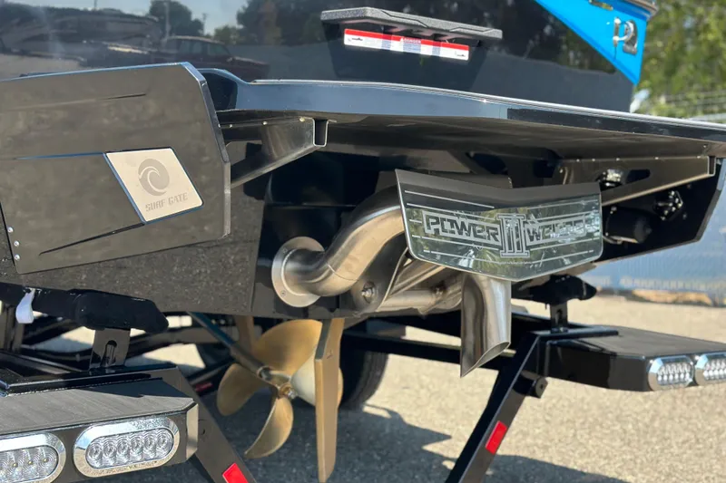 Slide: The Image of 2026 Axis T235 boat with Surf Gate and Power Wedge III features. - 4