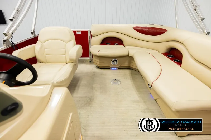 Slide: The Image of Luxurious interior of 2017 Sylvan 818 Mirage CR pontoon boat with beige seating. - 14