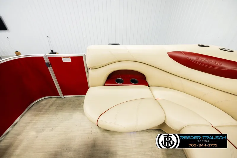 Slide: The Image of Luxurious seating on 2017 Sylvan 818 Mirage CR boat with red and cream upholstery. - 15